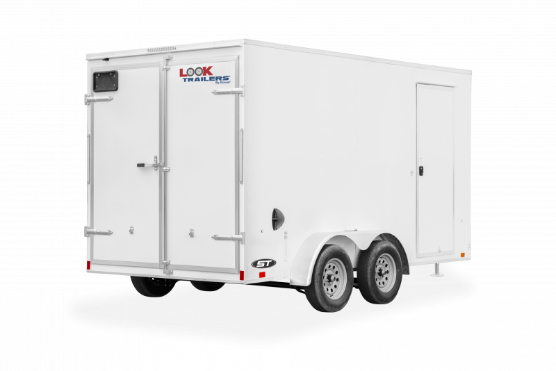 Look Trailers | Trailers | Trailer Models | ST DLX | Image of white enclosed cargo trailer with dual axles showing the back right of trailer with rear double door and a clear background | Image 8
