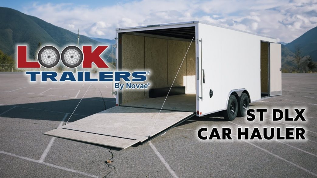 Look Trailers | Blog Post | Feature Callout | ST DLX Auto Hauler | Image of Good Auto Hauler Trailer with Rear Fold Down Door Open showing the ability to haul a car
